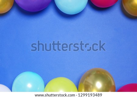Flat lay composition with balloons and space for text on color background