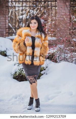 Portrait arabic woman in fur coat romantic outfit concept, walk outdoor 