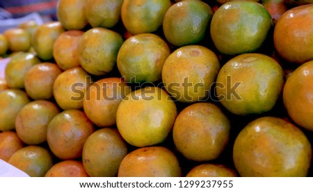 fresh organic oranges was organized on stall at folk market