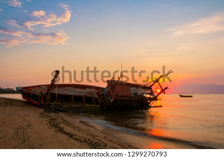 Boat crashes in the sea,Thailand. / An old shipwreck on beach. / Shipwreck in Chonburi province,Thailand.
