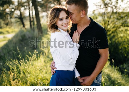 Portrait of a happy young couple enjoying a day in the park together 