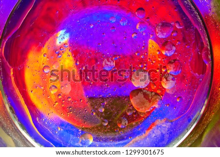 Close-up of Colourful Oil and Water Bubbles and Droplets.