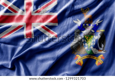 Waving detailed national country flag of South Georgia and the South Sandwich Island Royalty-Free Stock Photo #1299321703