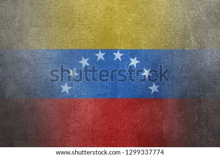 Venezuela flag on concrete background.