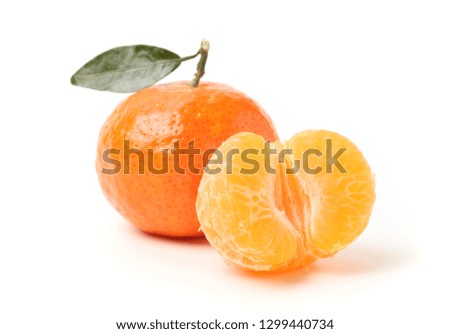 Tangerine or clementine with green leaf isolated on white 