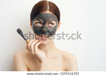 woman in a clay mask care beauty fresh skin
