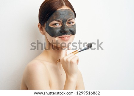 woman in a clay mask care beauty fresh skin