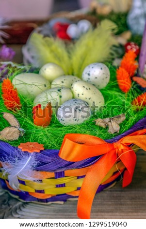 Small multicolored arrangement to decorate the house for Easter, made from children.