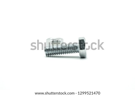 Nuts and bolts closeup on white background.Bolted screw closeup on white background.The screw, nut and bolts on white background.