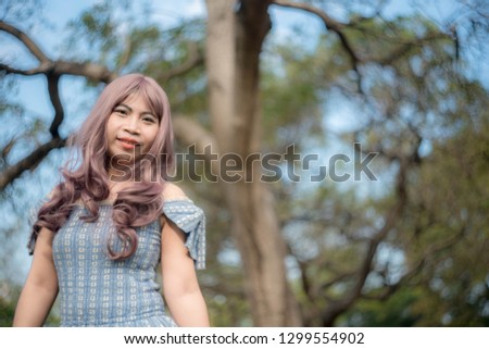 Women's fashion in the natural tree garden