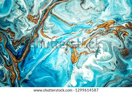 Marble texture. Eastern technique . Contemporary art. Golden and turquoise mixed acrylic paints. Can be used as a trendy background for wallpapers, posters, cards, invitations, websites.
