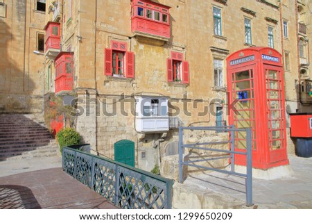 Photo taken in Malta in the month of January. The picture shows the picturesque streets of the old town of Valletta with their brightly painted balconies and windows.