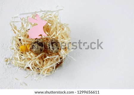 Happy Easter. Basket with eggs and rabbit