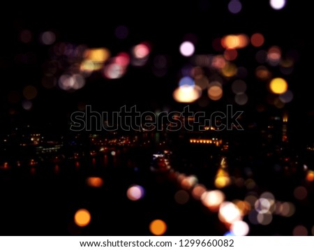 City lights at night with bokeh effect in Dubai Marina in blurred style