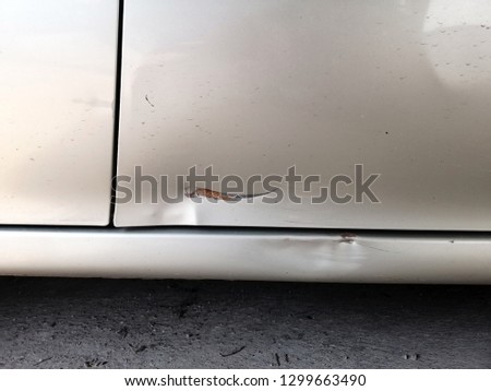 Scratch on a car's Door, 
Scratch on the car surface