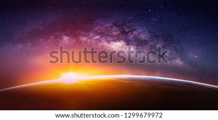Landscape with Milky way galaxy. Sunrise and Earth view from space with Milky way galaxy. (Elements of this image furnished by NASA) Royalty-Free Stock Photo #1299679972