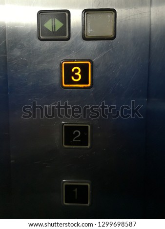 Lift button with floor numbers closeup