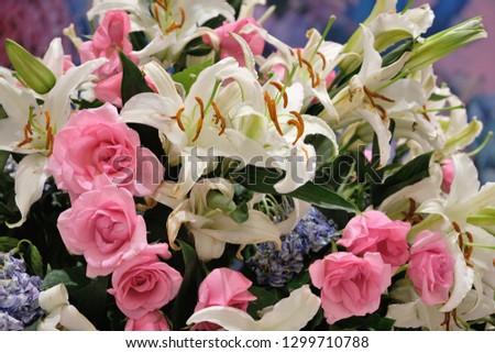bouquet of pink roses and white lily flowers