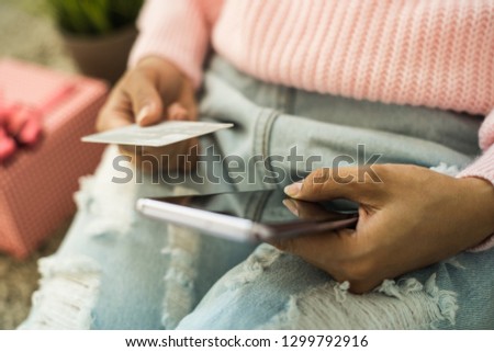 Young woman hands using smart phone for online shopping