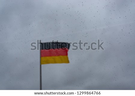 German Flag in a cloudly day, Berlin