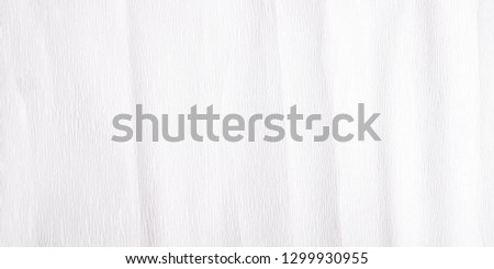 High resolution white crepe paper texture. Reaped paper background. Crumpled paper pattern.
