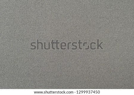 Rough texture of sandpaper. sandpaper background with vertical stripes.