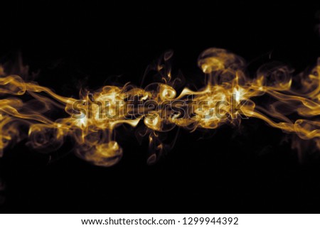 Abstract gold smoke on dark free  background, Soft movement glitter fire flame. Art flare and texture of amazing magic golden natural cloud on black background. light effect for creative and design.