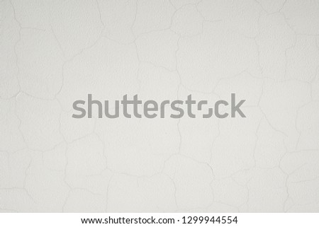 Plastered surface with cracks. Abstract background for design, banner and layout