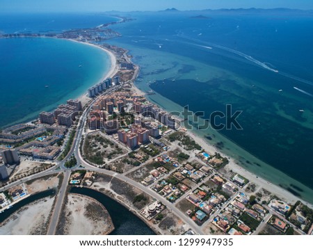 Aerial photo of buildings, villas and the beach on a natural spit of La Manga between the Mediterranean and the Mar Menor, Cartagena, Costa Blanca, Spain. 18