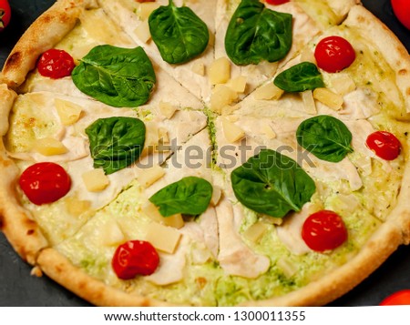 Delicious   pizza on a concrete background. Top view of hot pizza. 
