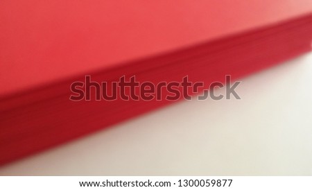 Blurred red envelopes