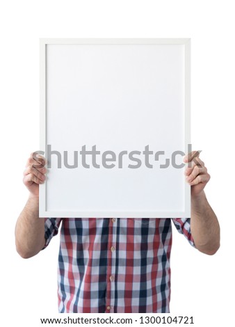 Holding frame mockup. Photo Mockup. The man hold frame. For frames and posters design. Frame size 16x20 (40x50cm).