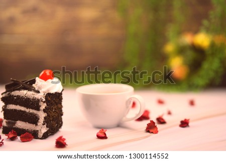 valentine cake and coffee in romantic lights                              