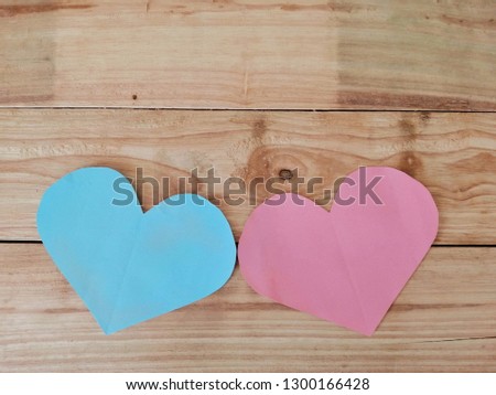 Pink and blue heart shape on wooden background, concept of happy​ valentine​ day, I love you, friendship