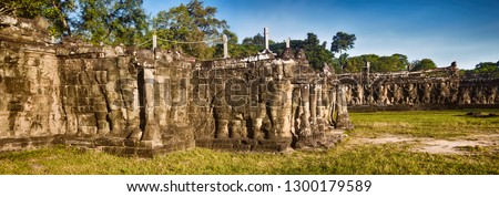 Bas-relief at Terrace of the Elephants at Angkor Thom temple complex. Siem Reap. Cambodia. Panorama