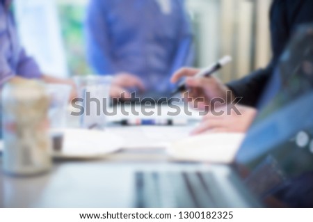 Corporate Seminar Event. Businessman Receiving Audience Sign-in. Blurred. Business Meeting. Investor Presentation Manager Accepting Attendee. Registration. Business People Working on Contract Deal.

