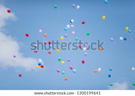festive launch of balloons