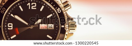 The dial of the wristwatch with a moving second hand symbolizing the run of time. A large plan.
