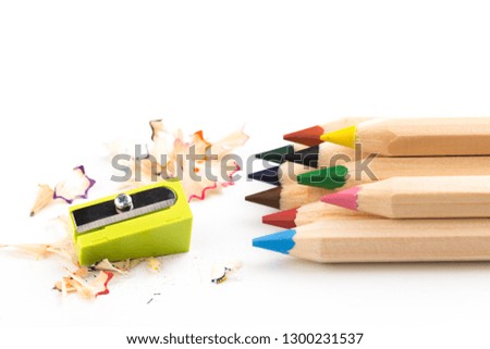 Wooden colorful pencils isolated on a white background, pencil sharpeners