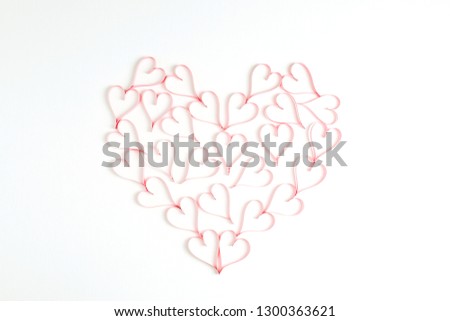 Heart symbol on white background. Flat lay, top view Valentines Day background love concept.
