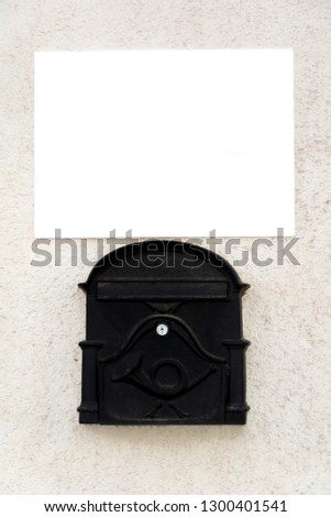 Mini Billboard Blank White Isolated Clipping above the vintage mailbox. Ad Space Advertisement.
