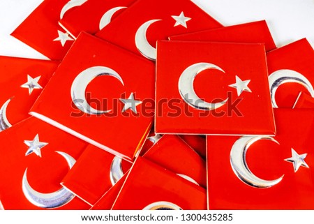 close up Turkish flag objects with moon and star on red color