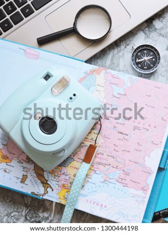 Camera, map and magnifier. Flat lay.Planning summer vacation concept. travel and wanderlust flat lay. 