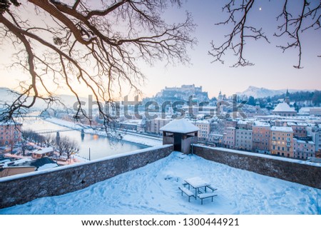 Classic panoramic view of the historic city of Salzburg with Salzach river in beautiful early morning light at sunrise in winter, Salzburg Land, Austria