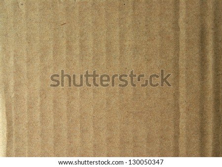 Closeup of brown cardboard paper for background.