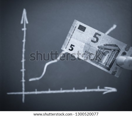 Chart with positive arrow and euro banknote.