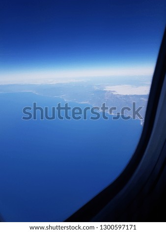View of the mountains and the Spanish sea from the airplane window