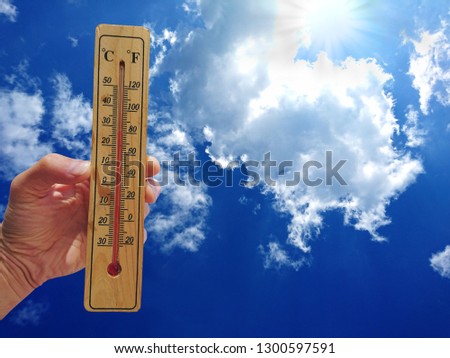 a thermometer in the sky indicates the heat