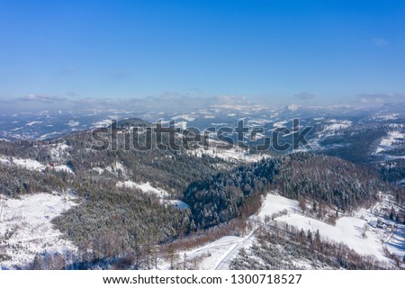 Winter scenery in Silesian Beskids mountains. View from above. Landscape photo captured with drone. Poland, Europe. 