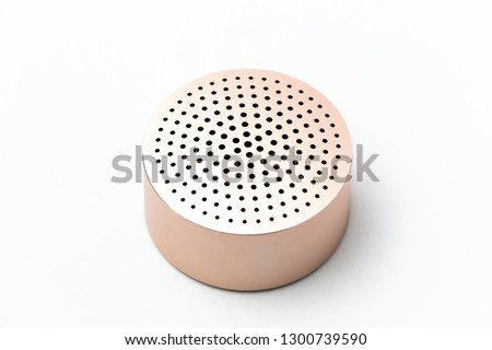 Isolated Gold Modern Material Design Bluetooth Speaker